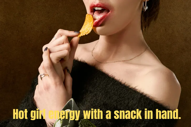 hot girl energy with a snack in hand. 
